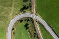 Picture of an aerial view with a drone of an unguarded railroad crossing in the Bavarian forest near Grafenau, Germany Royalty Free Stock Photo