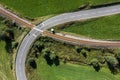 Picture of an aerial view with a drone of an unguarded railroad crossing in the Bavarian forest near Grafenau, Germany Royalty Free Stock Photo