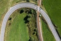 Picture of an aerial view with a drone of an unguarded railroad crossing in the Bavarian forest near Grafenau, Germany Royalty Free Stock Photo