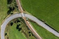 Picture of an aerial view with a drone of an unguarded railroad crossing in the Bavarian forest near Grafenau, Germany Royalty Free Stock Photo