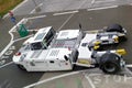 Picture of an airport tractor used to push planes to parking slots or to runways. Very powerfull airport equipment.