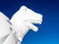 An artful created head of a Dinosaurier of snow