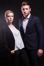 Picture of attractive couple of office workers standing Royalty Free Stock Photo