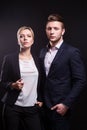 Picture of attractive couple of office workers standing Royalty Free Stock Photo