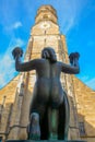 Backside of a bronze statue in front of the Stiftskirche in Stuttgart, Germany