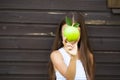 Picture of beautiful girl with green apple