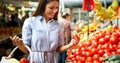 Picture of woman at marketplace buying fruits Royalty Free Stock Photo