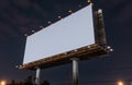 Picture of a big empty billboard against the night sky, branding marketing concept Royalty Free Stock Photo