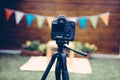 Picture of digital camera placed on tripod Royalty Free Stock Photo