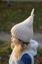 Picture of blonde toddler girl in the funny knitted hat