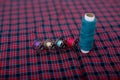 Picture of blue sewing thread and bobbins on the cloth Royalty Free Stock Photo