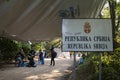 Refugees gathering behind the border sign on Serbia Croatia boundary in Berkasovo Bapska, on the Balkans Route