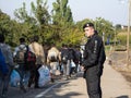 Croatian policeman from the border police watching migrants crossing the Serbia Croatia border in Berkasovo Bapska
