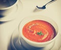 Picture of a bowl with tomato cream soup. Royalty Free Stock Photo