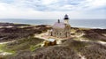 Brick lighthouse on a cloudy day on Block Island Rhode Island