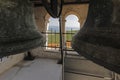 Picture of bronze bells in a bell tower of a historic church in Kratia