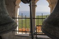 Picture of bronze bells in a bell tower of a historic church in Kratia