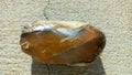 Picture of a brown flint stone, characterized by a very soft and very hard texture