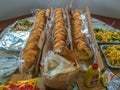 Buffet platter of sandwiches and trays of pasta Royalty Free Stock Photo