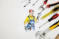 Picture of builder with tools.