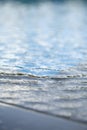 Pure water bokeh Clean water background with calm waves Blue sky reflection Royalty Free Stock Photo