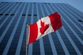 Canadian flag in front of a business building in Ottawa, Ontario, Canada. Ottawa is the capital city of Canada