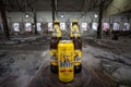Can and bottle of Jelen Pivo Beer in an abandoned factory. Jelen pivo is a light beer Royalty Free Stock Photo