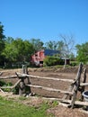 A picture of a cedar rail fence, horse paddock and an old barn Royalty Free Stock Photo