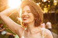 Picture of Cheerful beauty woman in dress and straw hat