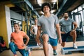 Picture of cheerful fitness team in gym