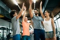 Picture of cheerful fitness team in gym