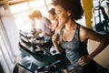 Picture of cheerful fitness team in gym