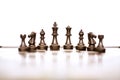 Picture of chess board game and black chess pawns Royalty Free Stock Photo