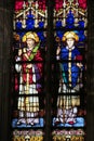 Picture of christian saints on stained glass in the church Royalty Free Stock Photo