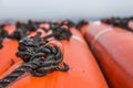 Closeup of the rope on life boats on a ship