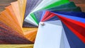 The picture with the colour samples of laminated films for the banner design. Dark background. Design material Royalty Free Stock Photo