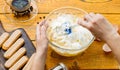 Picture of cooking tiramisu, human hands