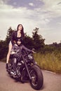 picture with a couple of beautiful young bikers Royalty Free Stock Photo