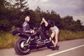 Picture with a couple of beautiful young bikers Royalty Free Stock Photo