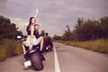 Picture with a couple of beautiful young bikers Royalty Free Stock Photo