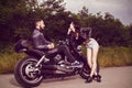 Picture with a couple of beautiful young bikers Royalty Free Stock Photo