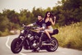 Picture with a couple of beautiful young bikers Royalty Free Stock Photo