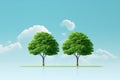 Picture of couple of trees standing in grass. Can be used to depict nature, landscape, or environmental concepts