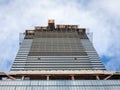 Cranes and building devices on a construction site of a skyscraper in downtown Toronto, surrounded by other high rise towers Royalty Free Stock Photo