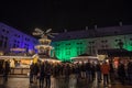 Crowd gathering on front of the stands of the Munich Christmas market Christkindlmarkt.