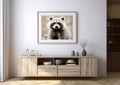 picture of a cute animal on the wall above a piece of furniture in a living room