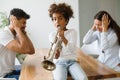 Picture of child making noise by playing trumpet Royalty Free Stock Photo