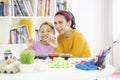 Child and mother showing a painted Easter egg Royalty Free Stock Photo