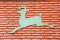 Picture deer on brick wall