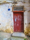 Derelict house with rustic old door Royalty Free Stock Photo